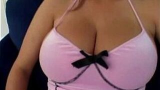 This sexy big tit brunette milf is sucking a big cock porn video